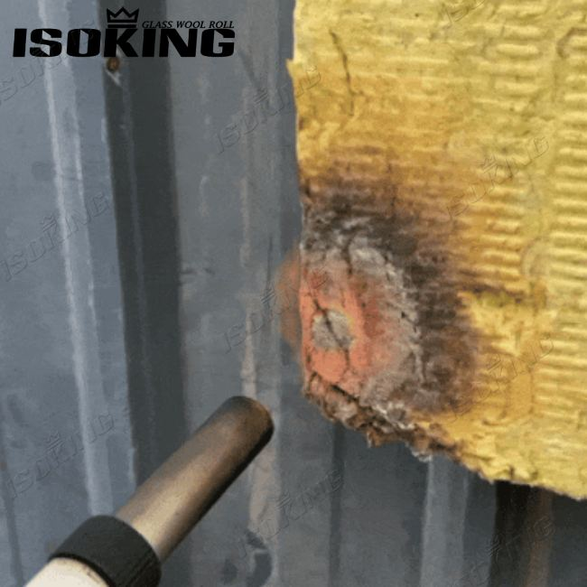 Rigid mineral wool board subjected to intensive direct fire exposure highlighting extreme high-temperature resistance and stability.