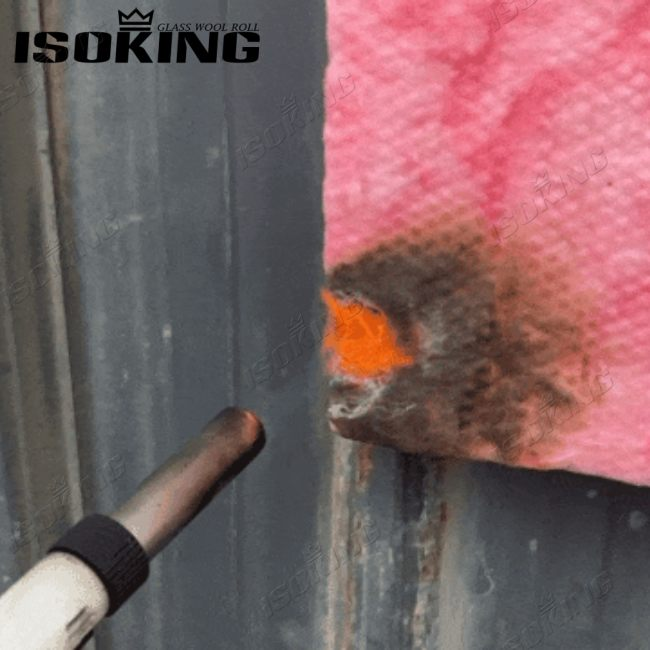 High-performance fiberglass batt insulation under torch flame test demonstrating superior non-combustible and fire-resistant properties.