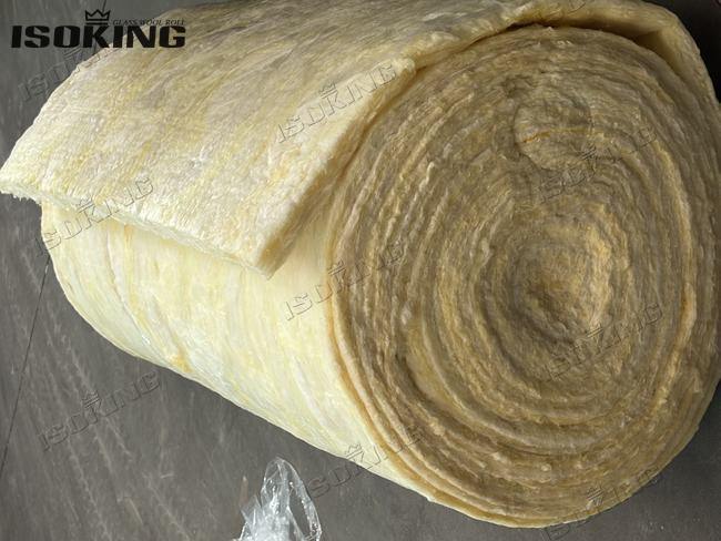 Side view of rolled IKING thermal glass wool showing uniform fiber structure and density
